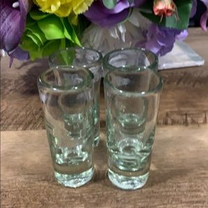 Four shot glasses